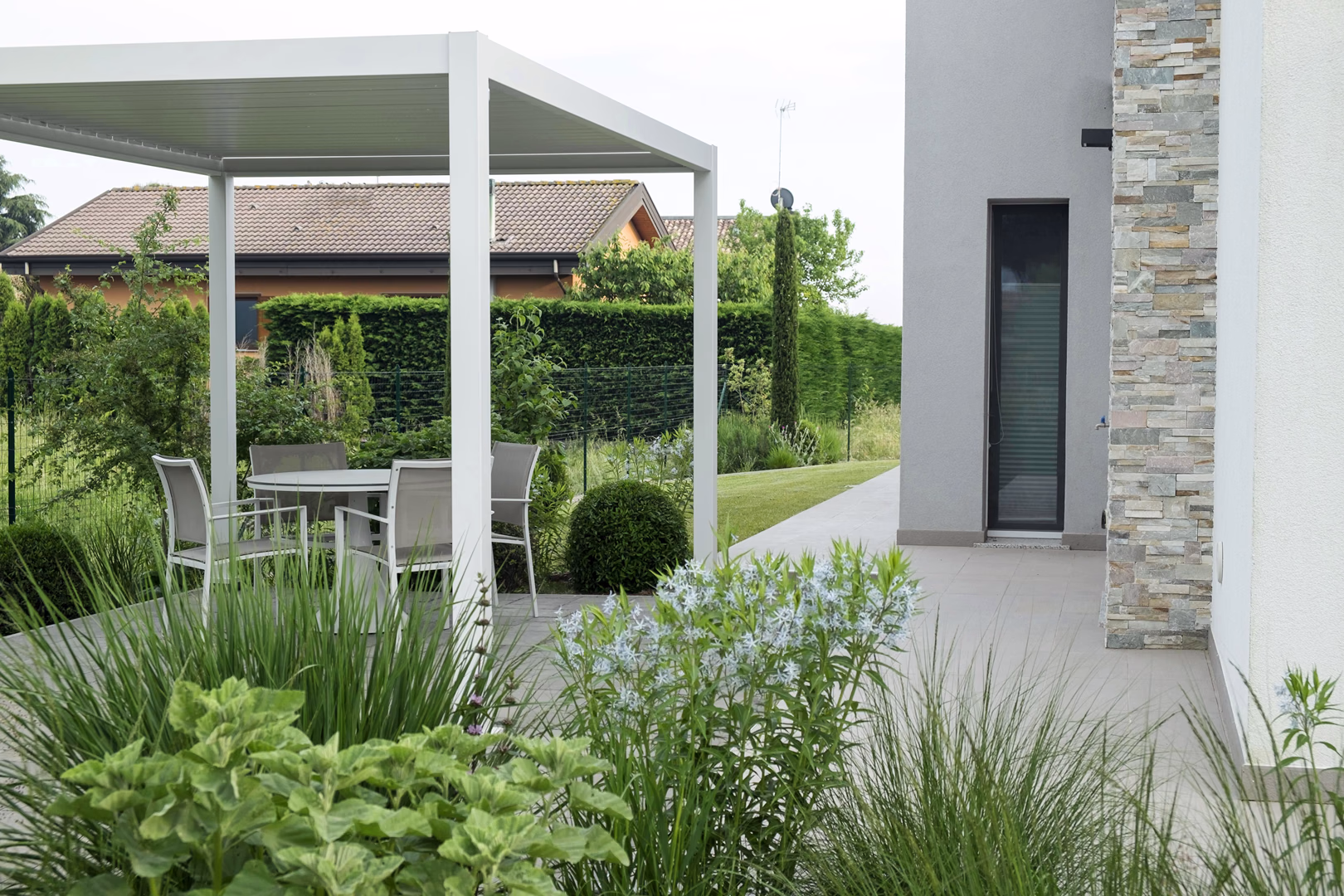 View 5 of the “Mediterranean Grass” garden design, created by Roberto Landello.